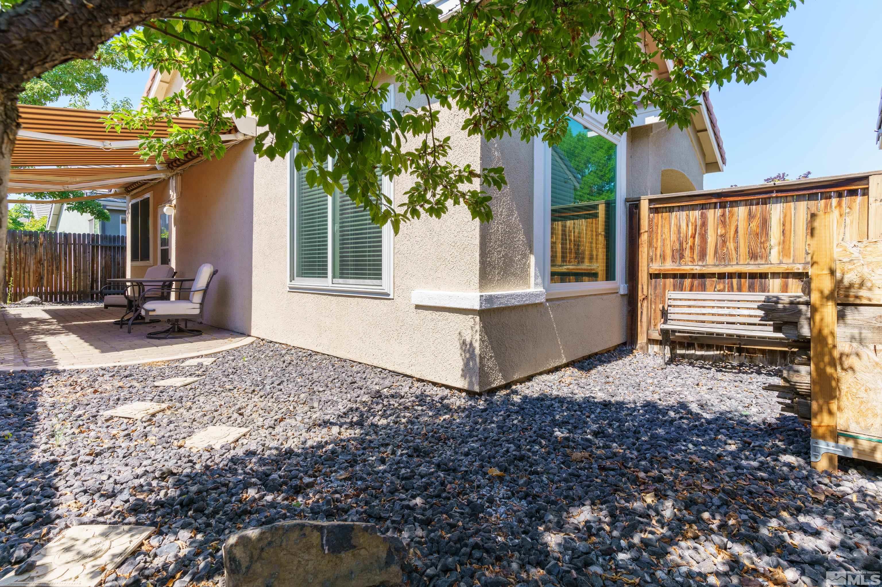 10412 Rockport Lane Reno, NV 89521 - Photo 13 of 15 a view of a house with backyard and sitting area
