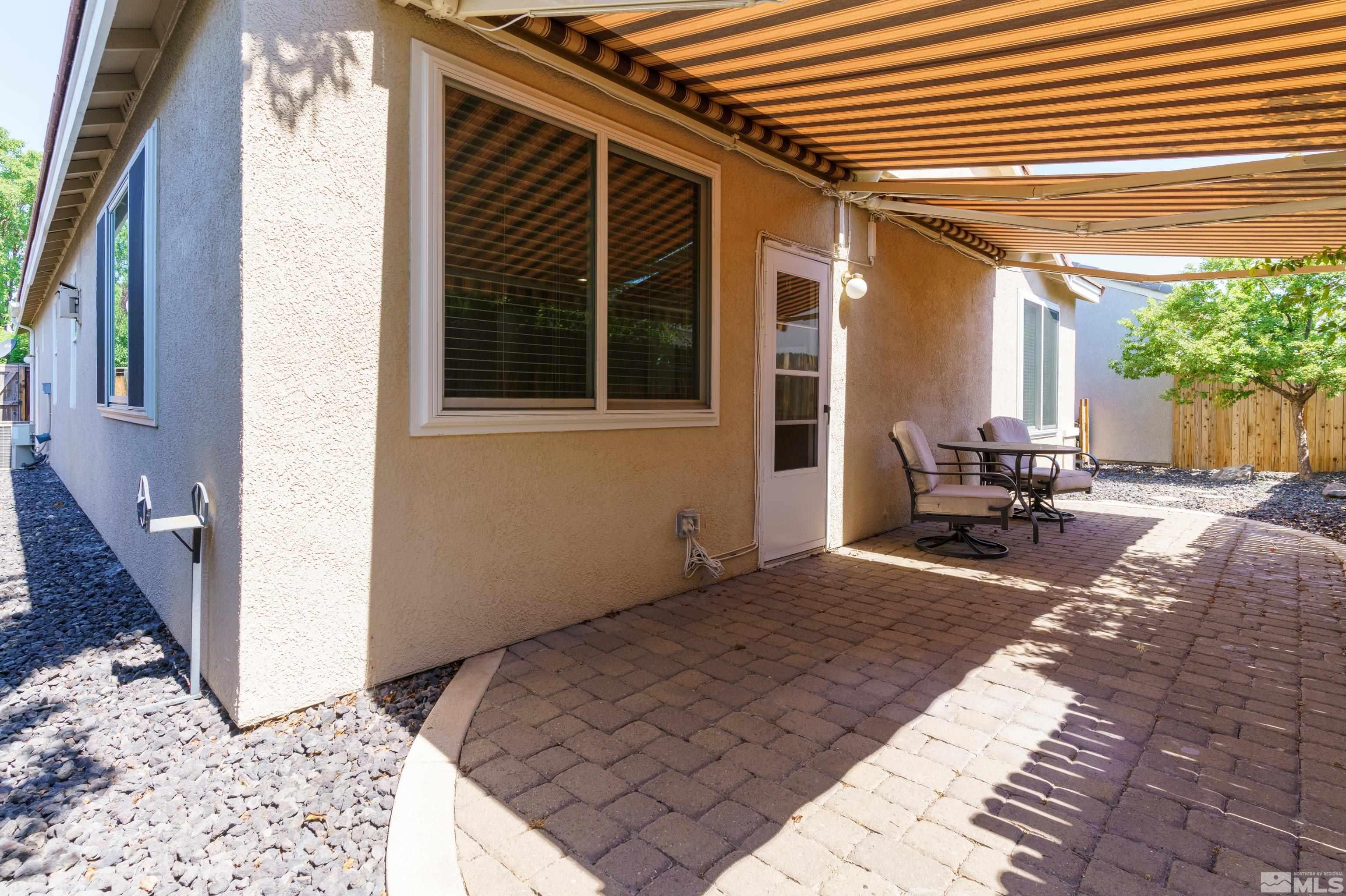 10412 Rockport Lane Reno, NV 89521 - Photo 14 of 15 a view of chair and tables in the patio