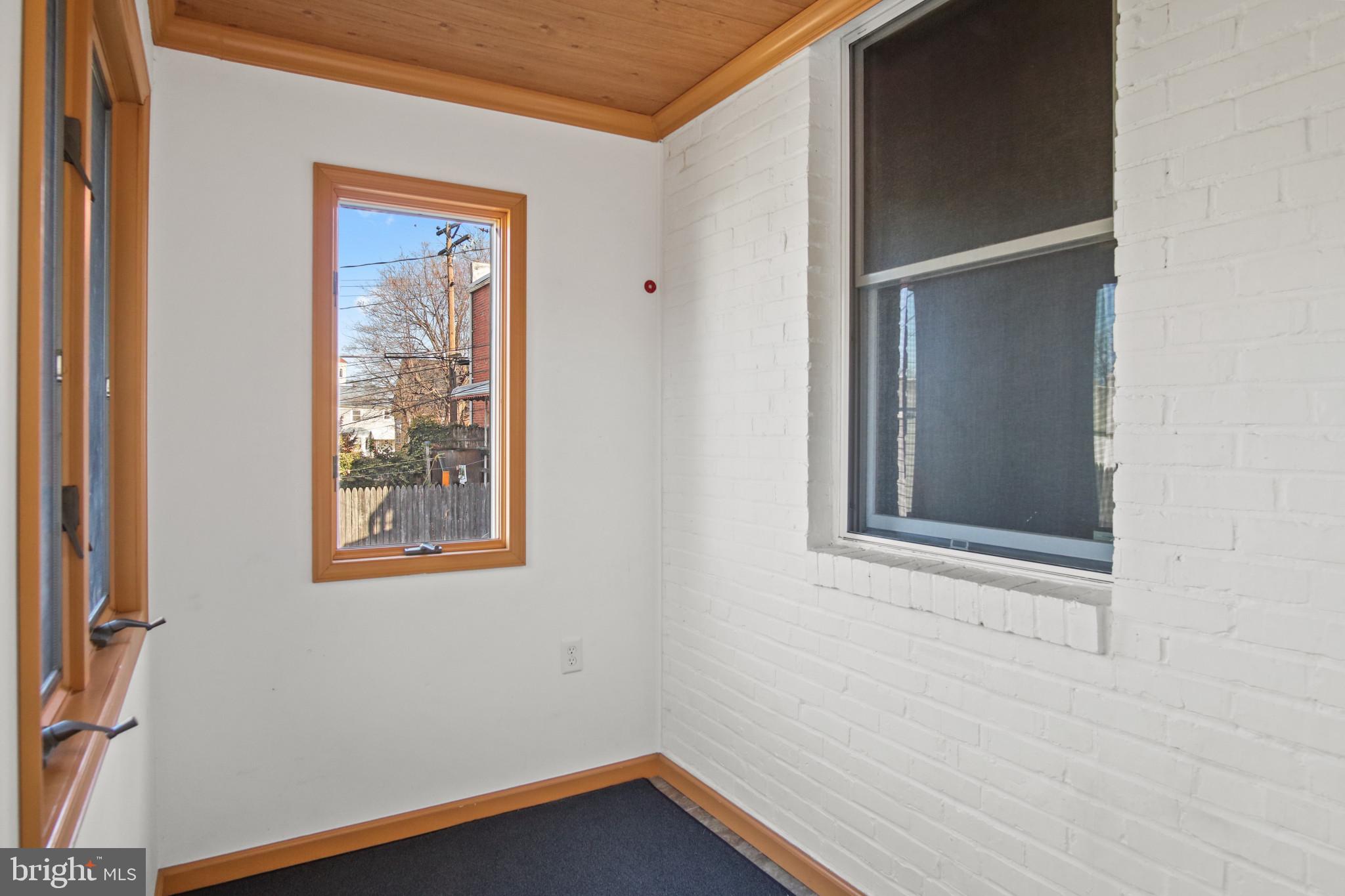 102 Willow Spring Road Baltimore, MD 21222 - Photo 15 of 28 an empty room with windows and closet