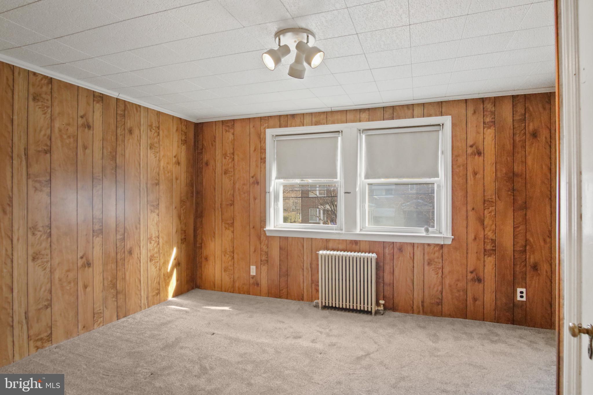 102 Willow Spring Road Baltimore, MD 21222 - Photo 20 of 28 a view of an empty room with a window
