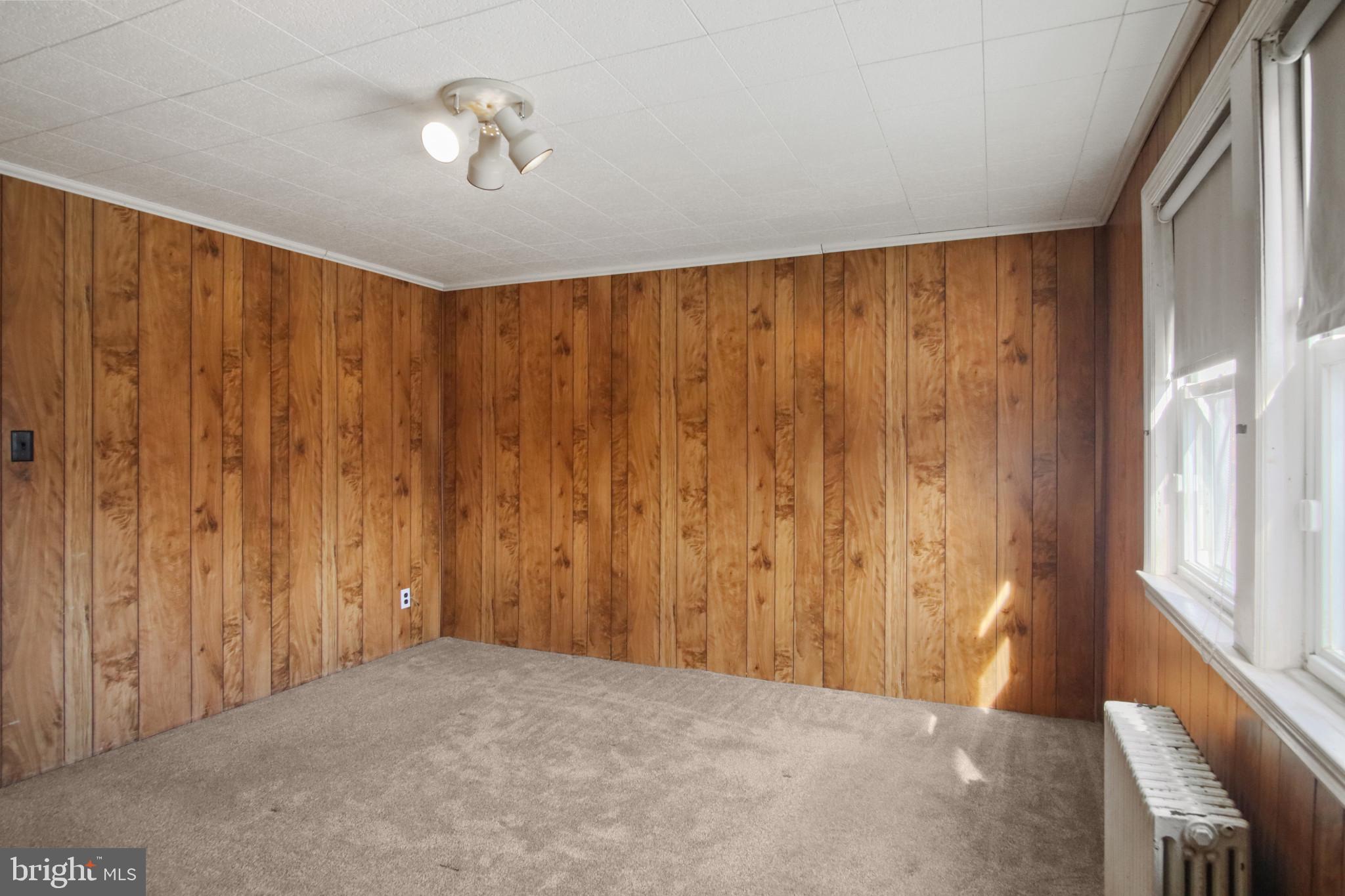 102 Willow Spring Road Baltimore, MD 21222 - Photo 21 of 28 a view of a room with a wooden door