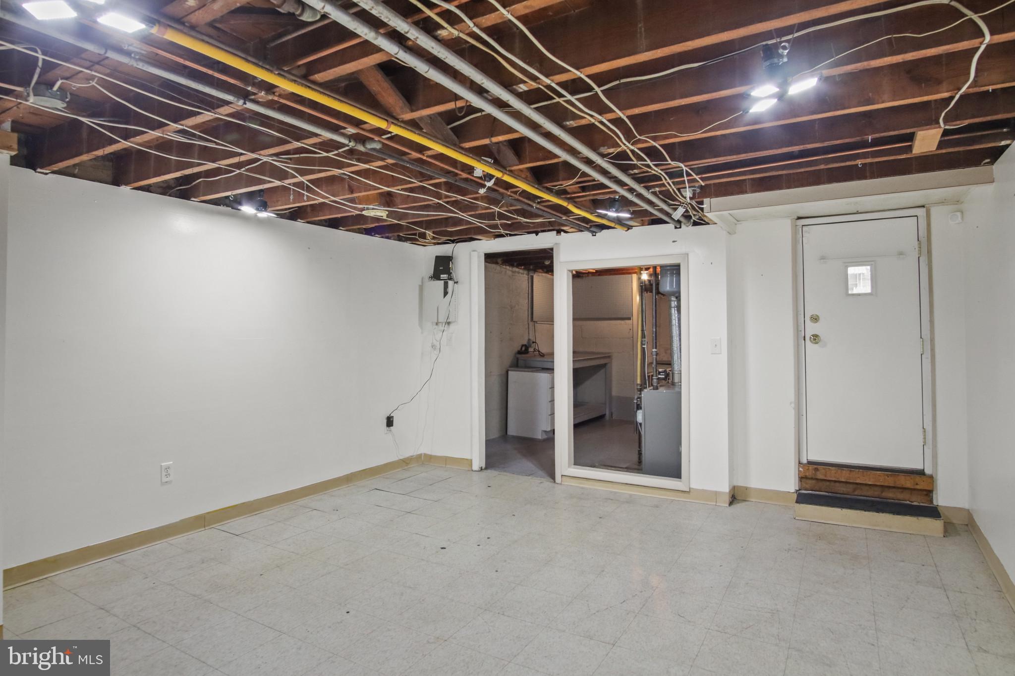 102 Willow Spring Road Baltimore, MD 21222 - Photo 23 of 28 a view of room with wooden floor