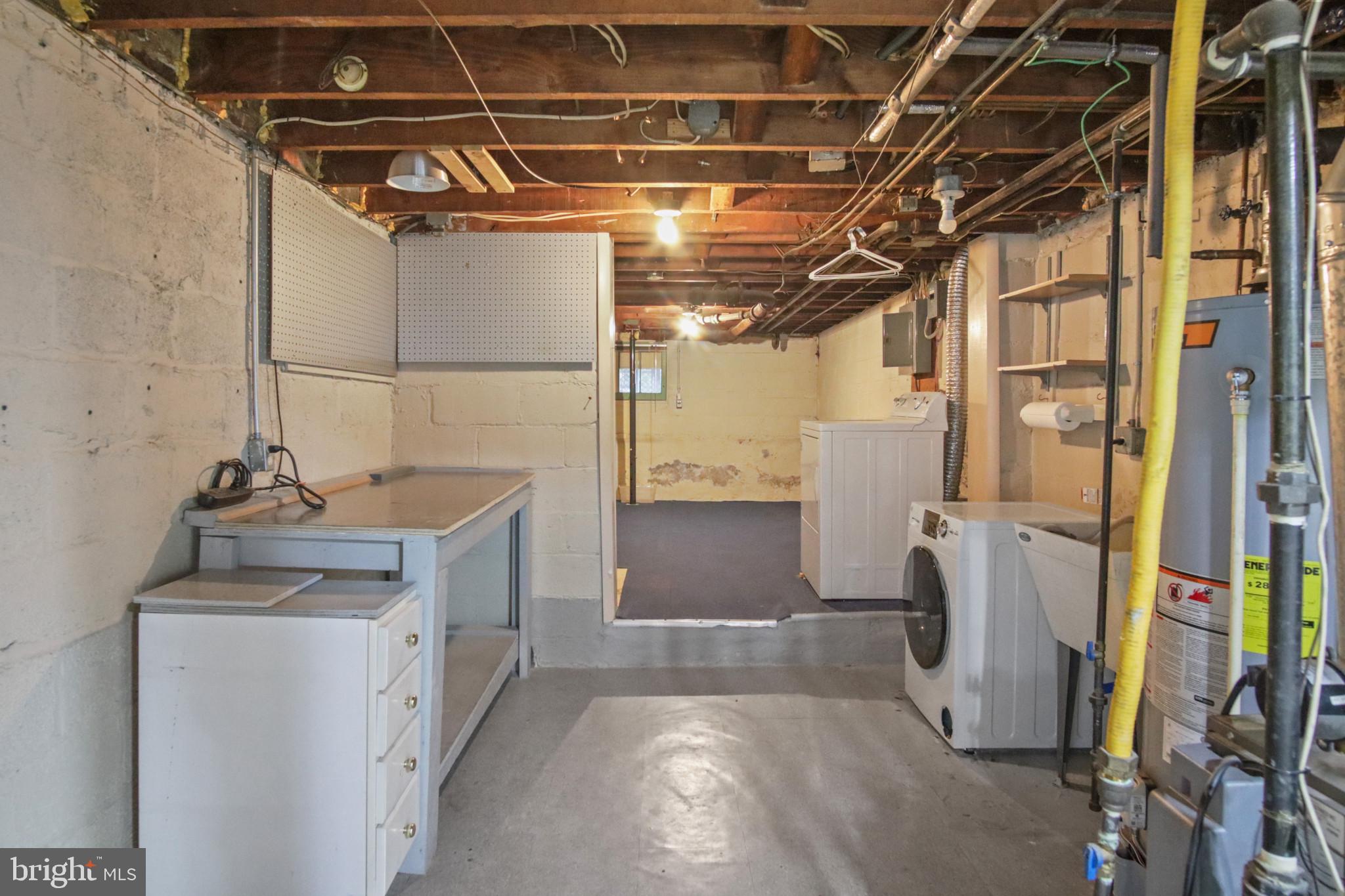 102 Willow Spring Road Baltimore, MD 21222 - Photo 25 of 28 a utility room with dryer and washer