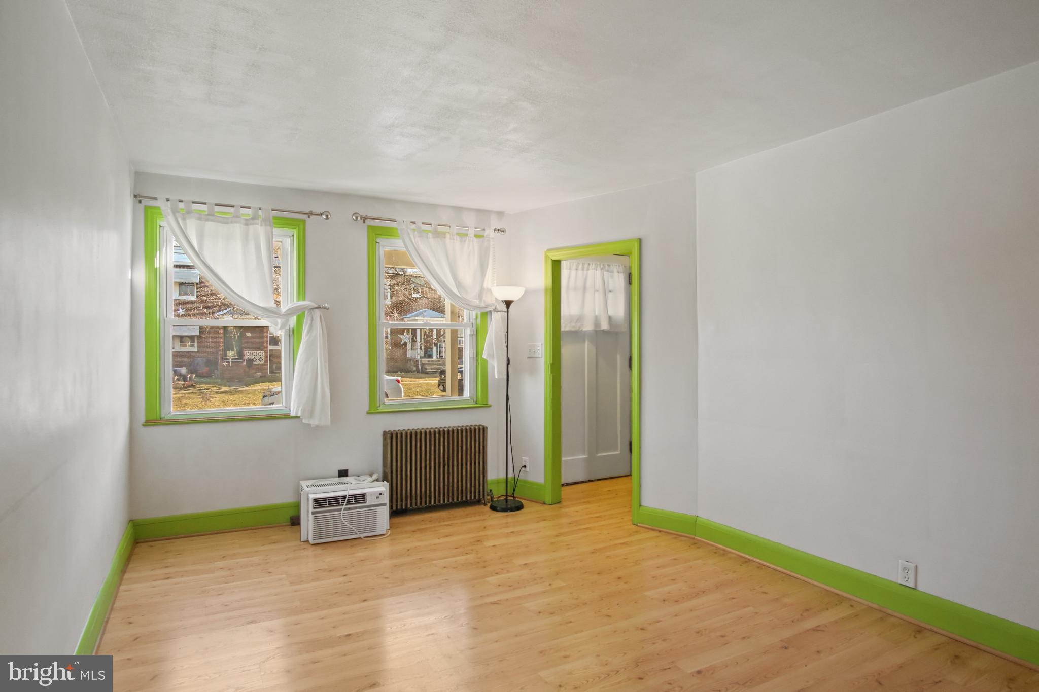 102 Willow Spring Road Baltimore, MD 21222 - Photo 7 of 28 a view of an empty room with window