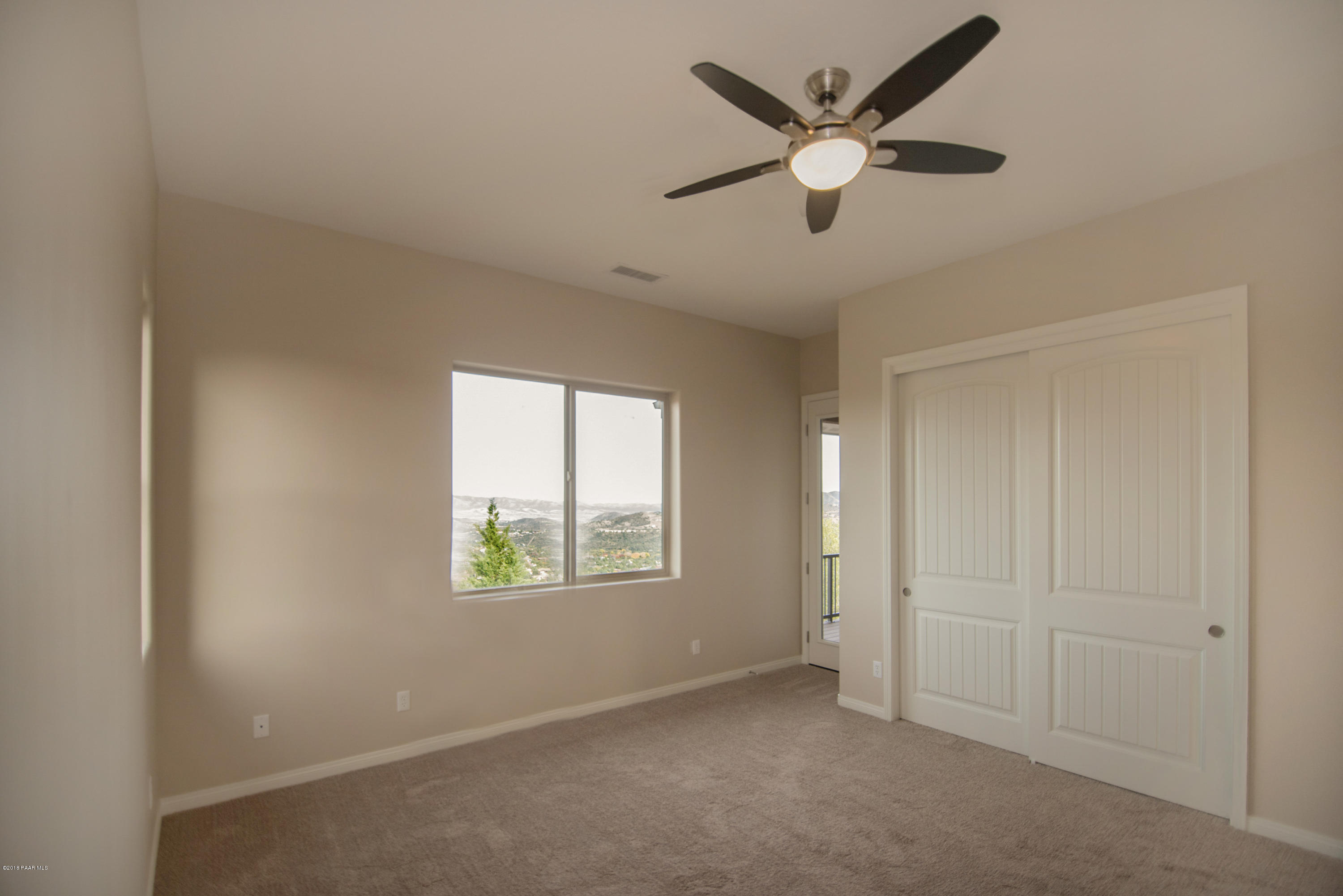 531 Miracle Rider Road Prescott, AZ 86301 - Photo 12 of 31 a view of an empty room with a window
