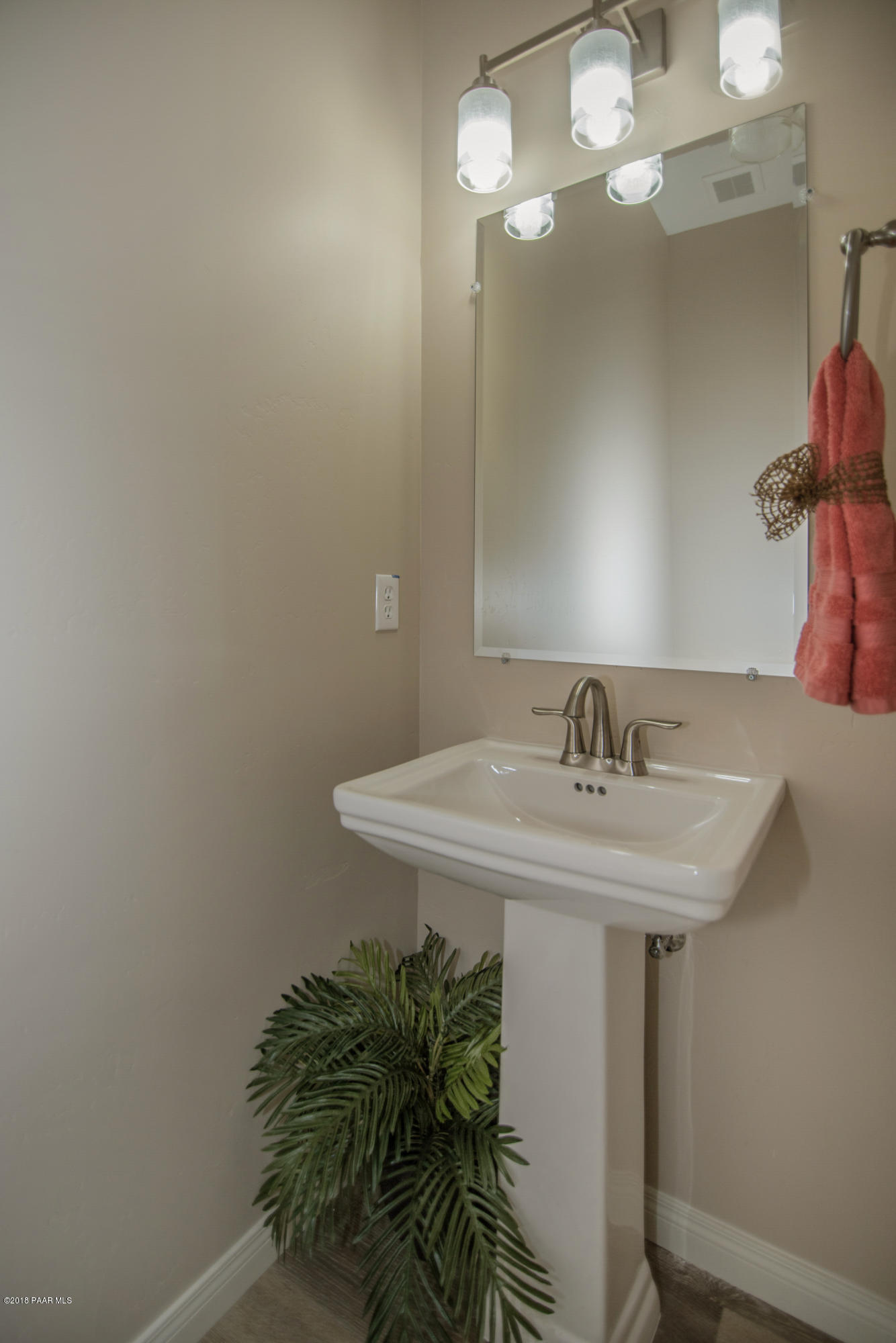 531 Miracle Rider Road Prescott, AZ 86301 - Photo 13 of 31 a bathroom with a sink and a mirror