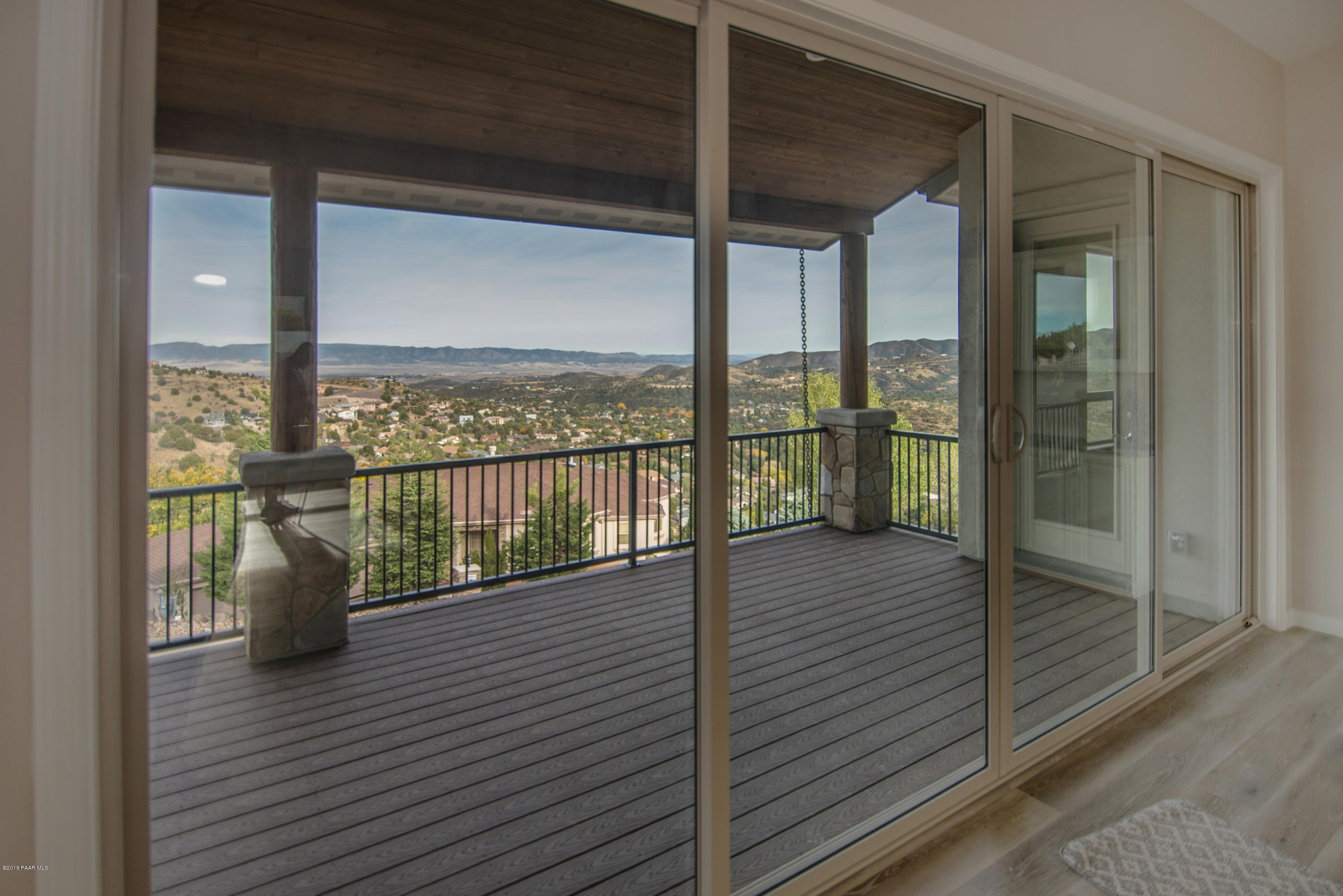 531 Miracle Rider Road Prescott, AZ 86301 - Photo 14 of 31 a view of a balcony with floor to ceiling window wooden floor with wooden floor