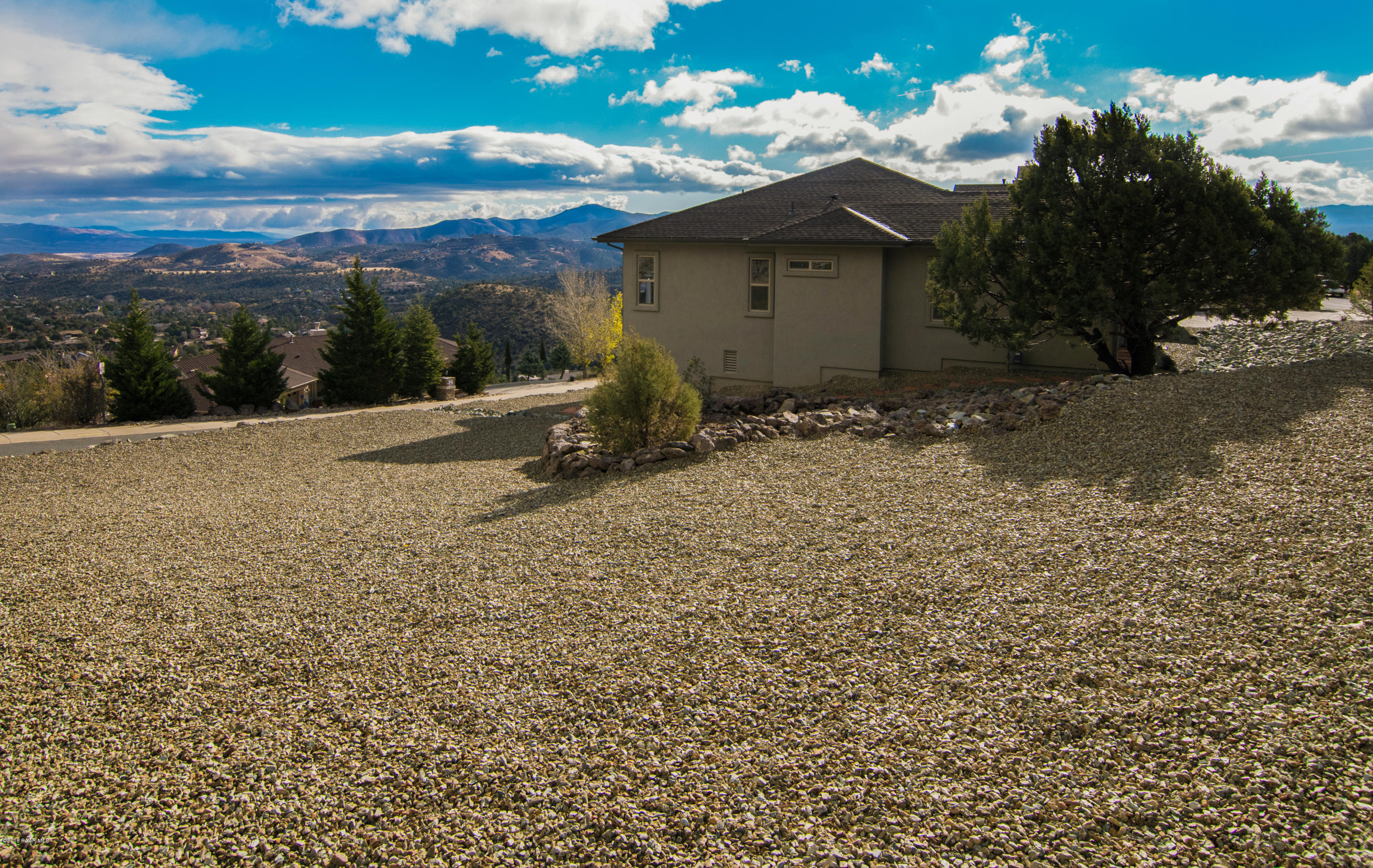 531 Miracle Rider Road Prescott, AZ 86301 - Photo 27 of 31 a view of a house with a yard