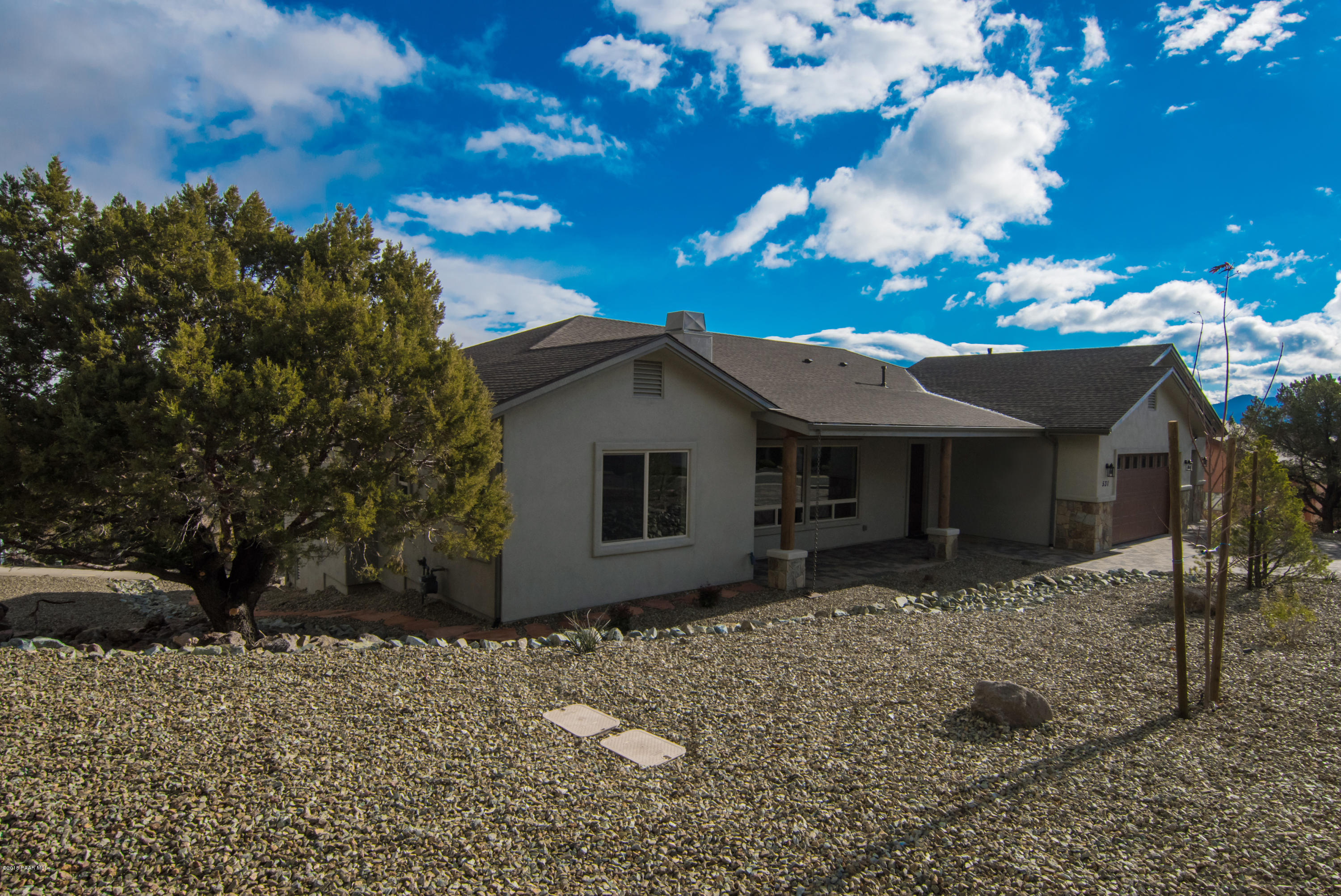 531 Miracle Rider Road Prescott, AZ 86301 - Photo 28 of 31 a view of a house with a yard