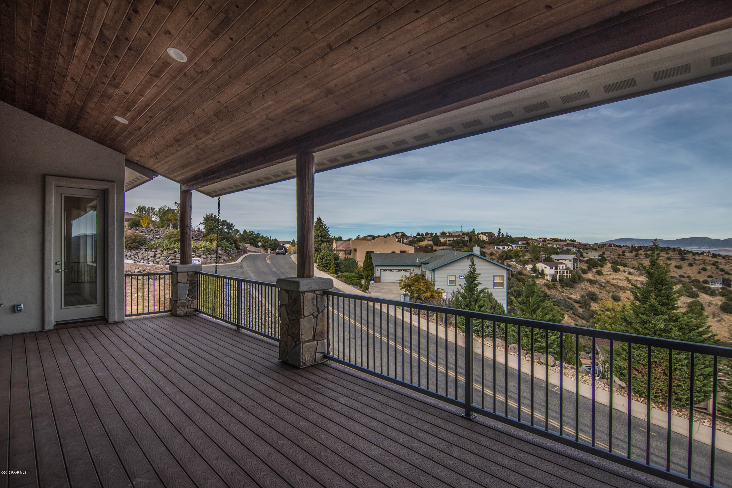 531 Miracle Rider Road Prescott, AZ 86301 - Photo 8 of 31 a view of a balcony with wooden floor