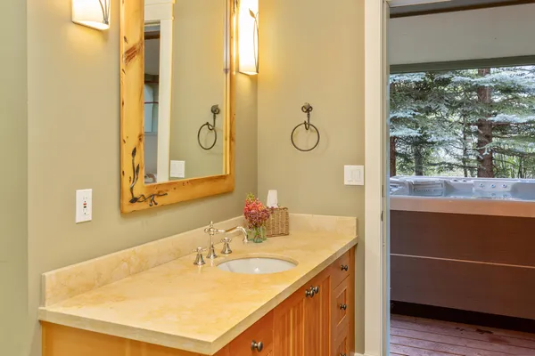 an aerial view of a houses with street