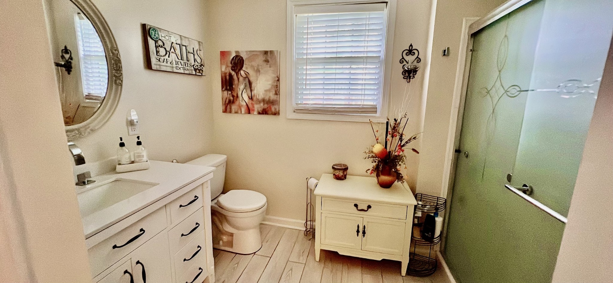 319 Copeland Road Clarksville, TN 37042 - Photo 14 of 30 a bathroom with a sink mirror vanity and toilet