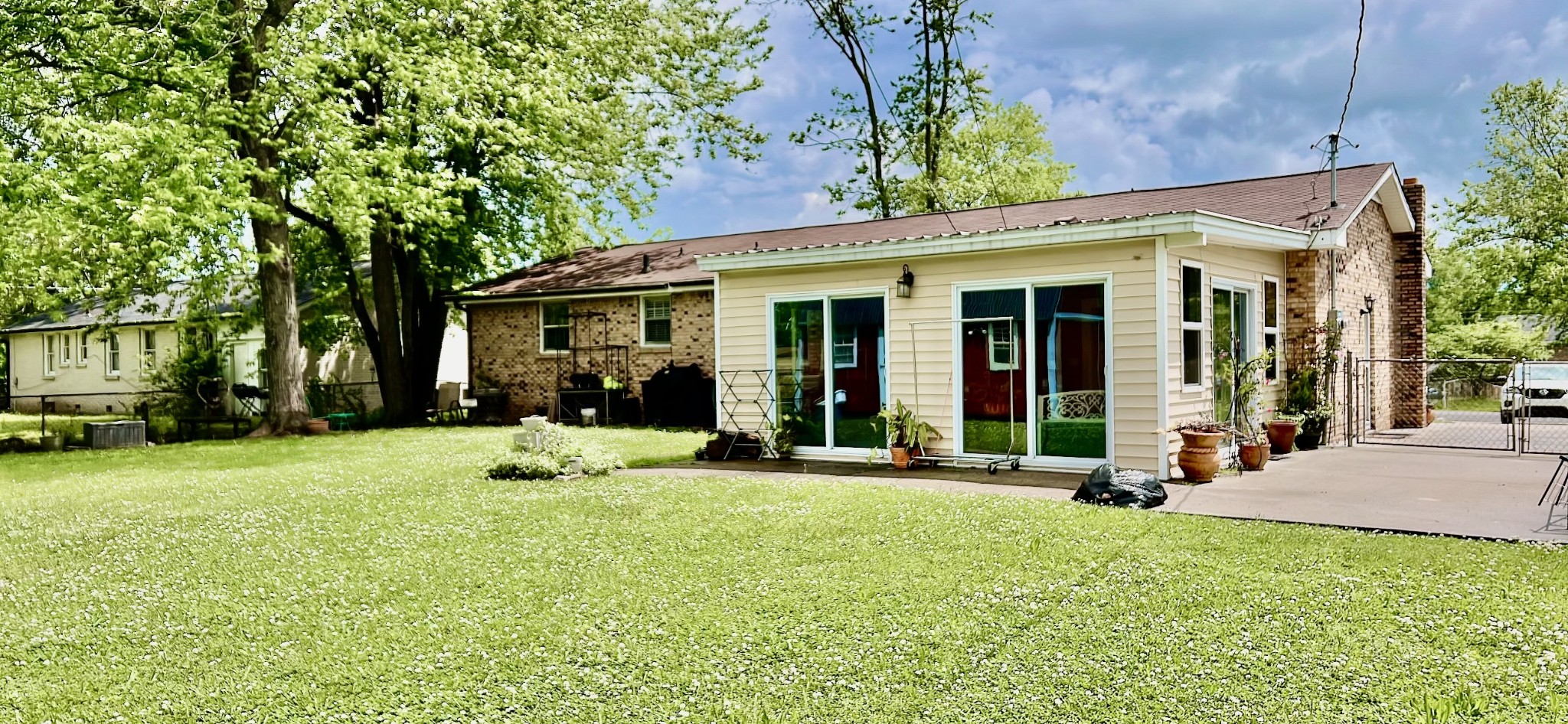 319 Copeland Road Clarksville, TN 37042 - Photo 26 of 30 a view of a house with backyard porch and sitting area
