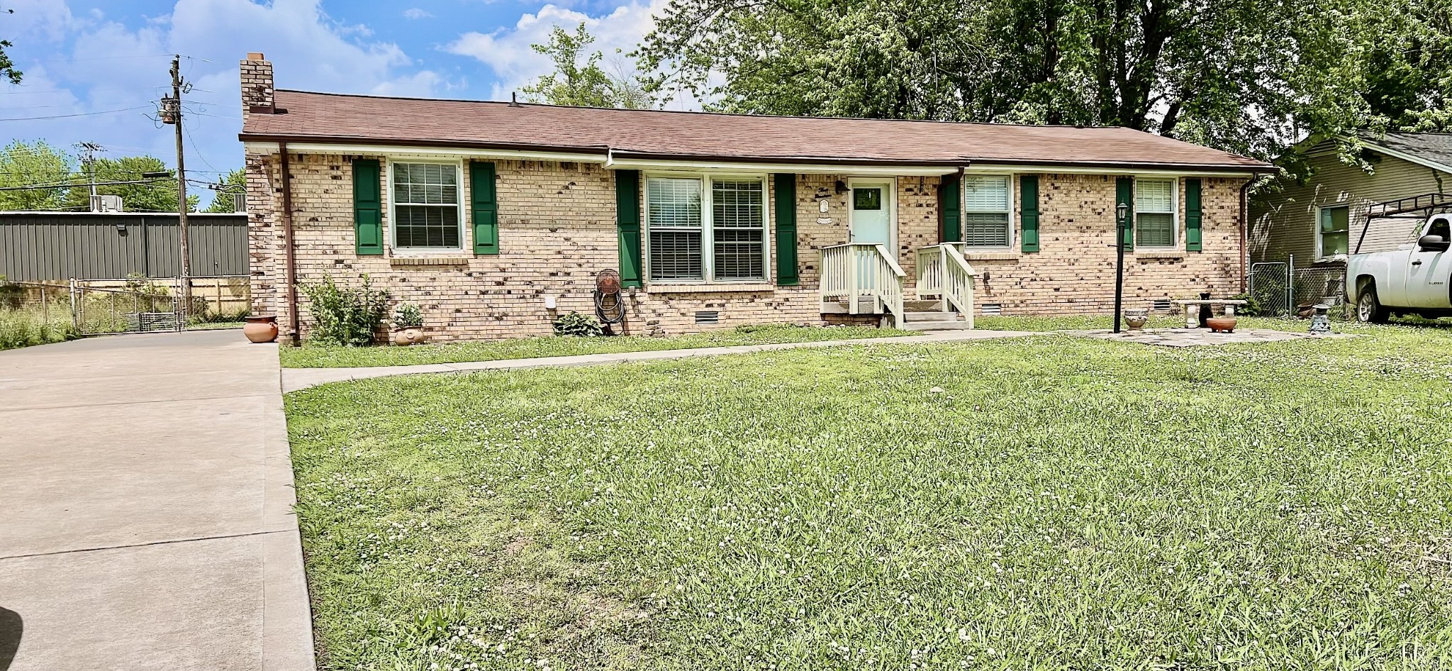319 Copeland Road Clarksville, TN 37042 - Photo 27 of 30 a front view of a house with a yard table and chairs
