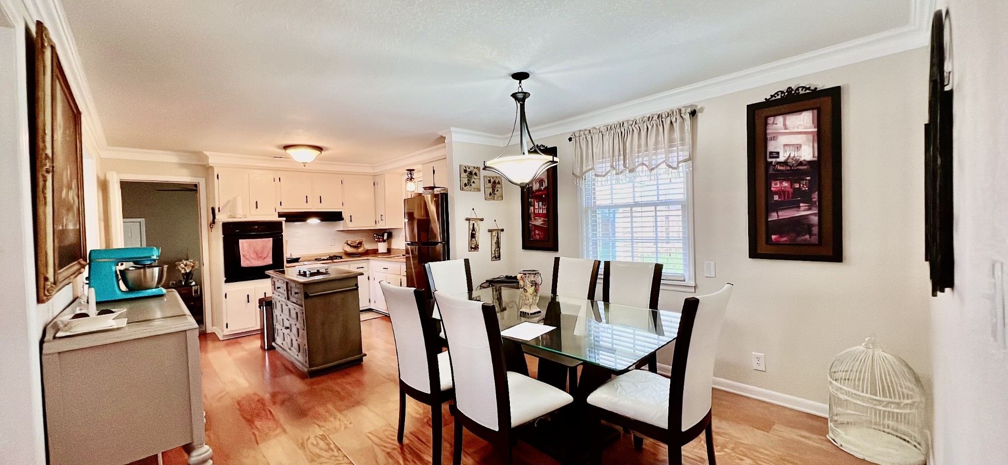319 Copeland Road Clarksville, TN 37042 - Photo 9 of 30 a view of a dining room with furniture and wooden floor