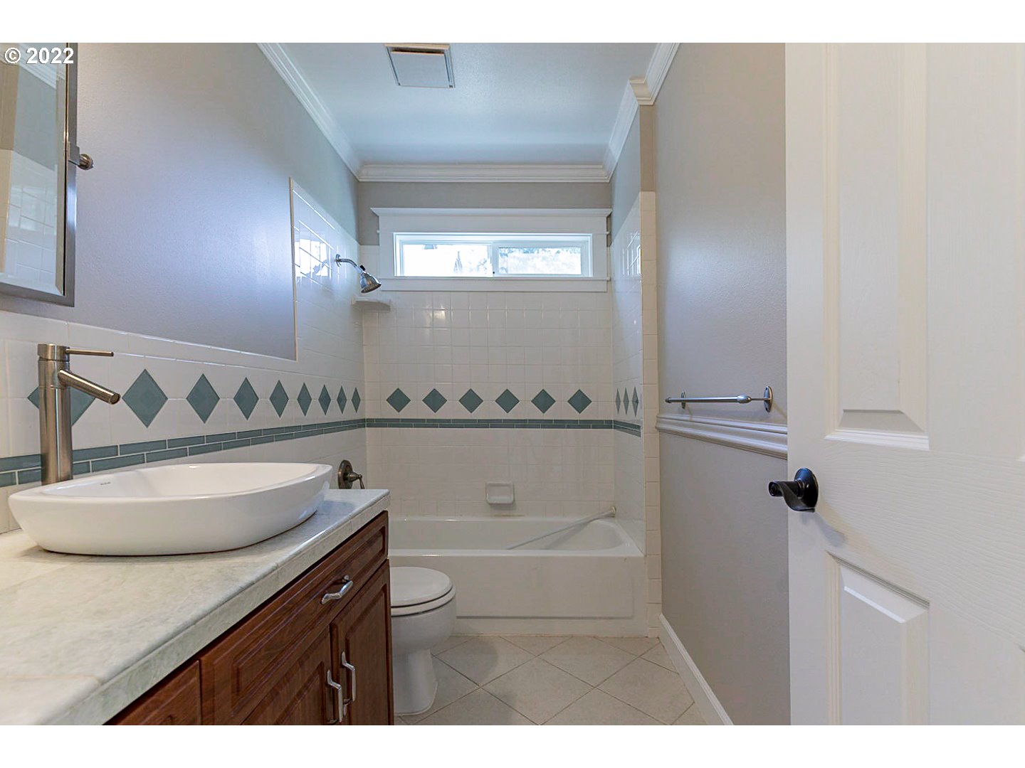 1302 Southwest 19th Drive Gresham, OR 97080 - Photo 4 of 32 a bathroom with a sink and a mirror