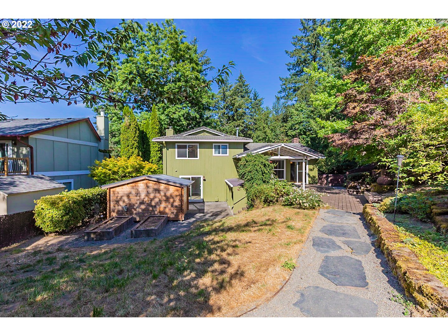 1302 Southwest 19th Drive Gresham, OR 97080 - Photo 5 of 32 a backyard of a house with yard and outdoor seating