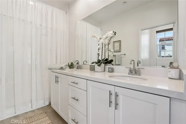 a view of a livingroom with furniture and windows