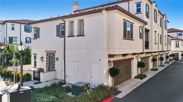 a view of a house with many windows