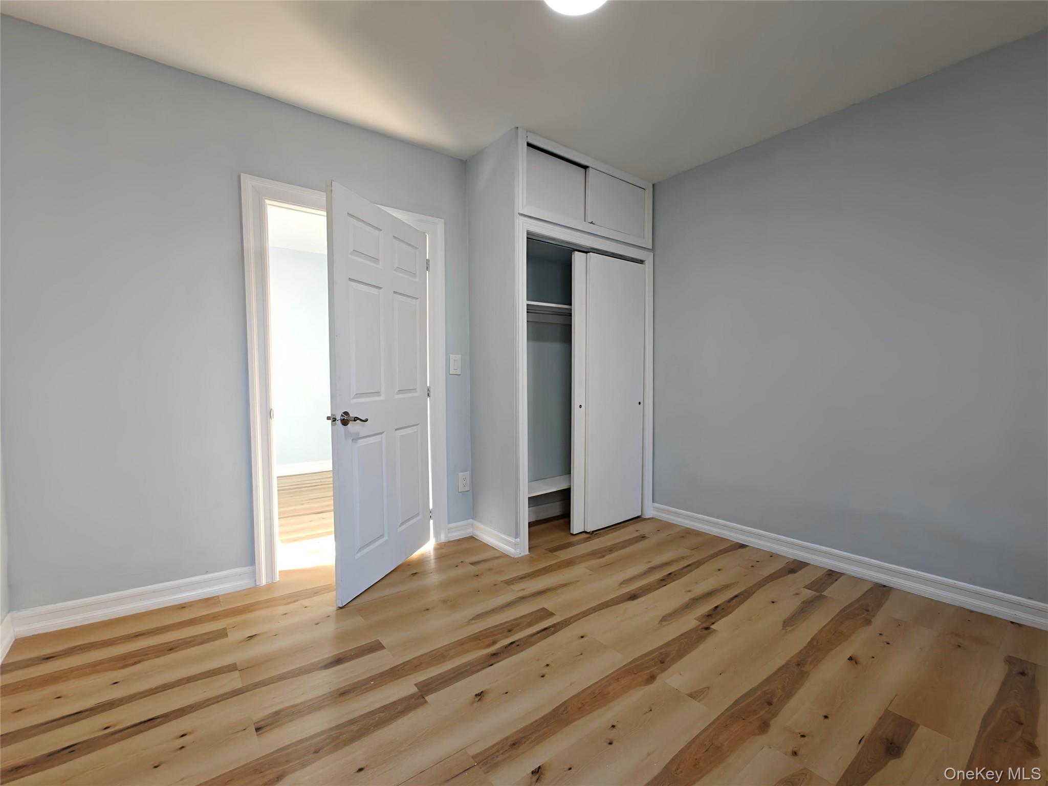 30 Macombs Place, Unit 44 Manhattan, NY 10039 - Photo 12 of 13 wooden floor in an empty room
