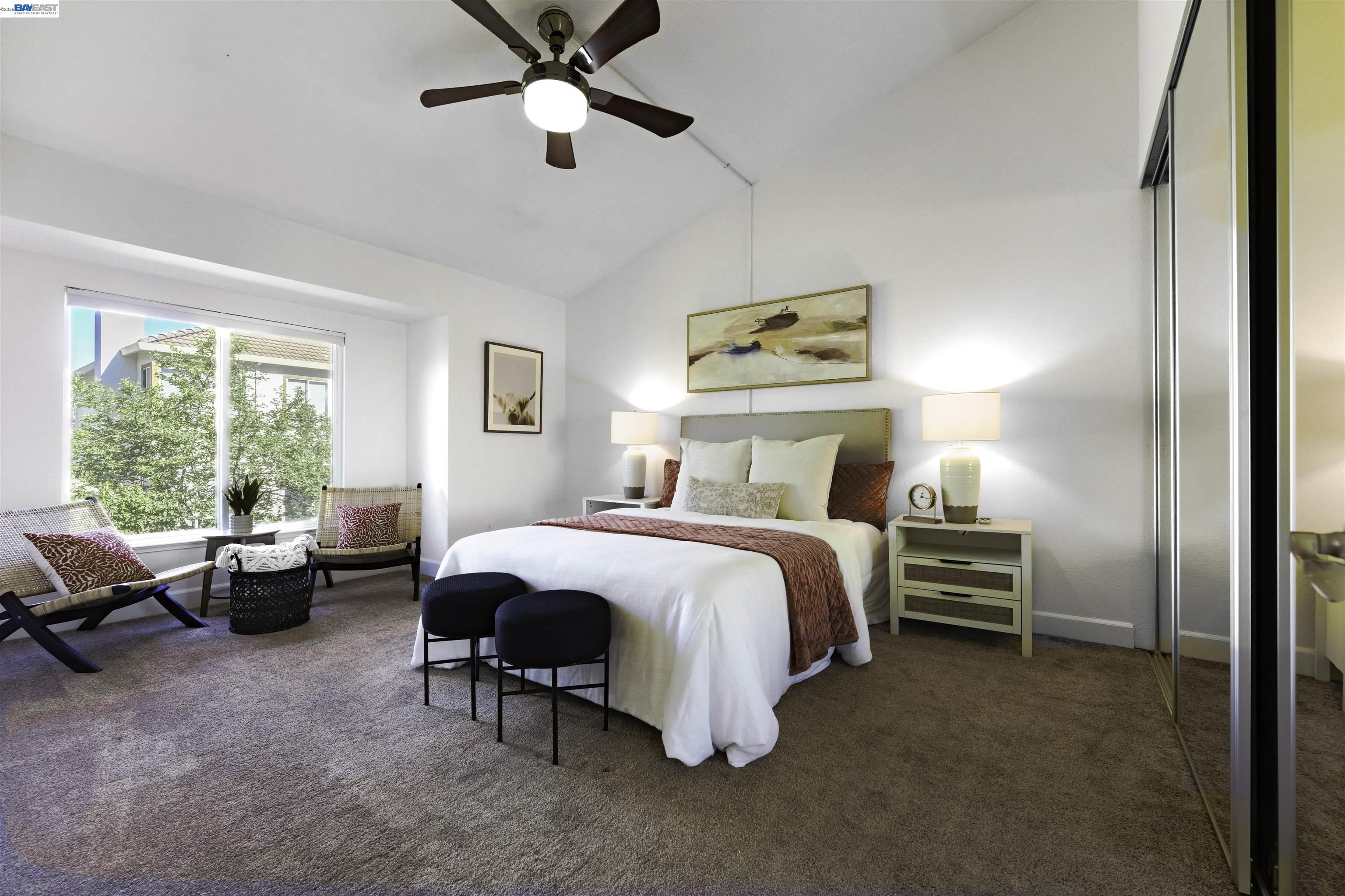 364 Eastridge Drive San Ramon, CA 94582 - Photo 12 of 23 a bedroom with a bed and a chandelier