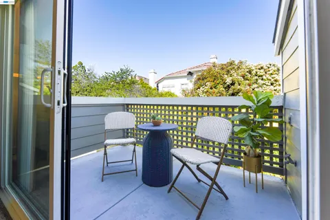 a view of a chairs in a balcony