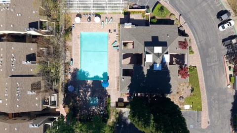 an aerial view of residential building with outdoor space