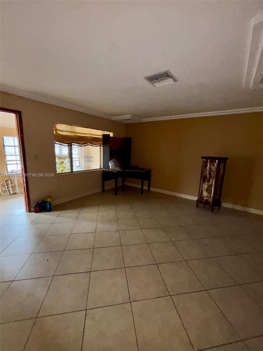 3241 Arthur Terrace Hollywood, FL 33021 - Photo 14 of 22 a view of an empty room with a window