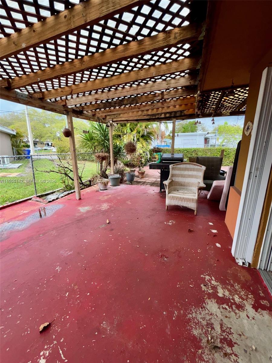 3241 Arthur Terrace Hollywood, FL 33021 - Photo 20 of 22 a view of a porch with wooden floor