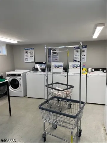 a kitchen with refrigerator and white stove