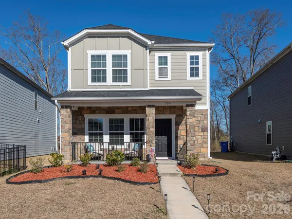 a backyard of a house with seating space