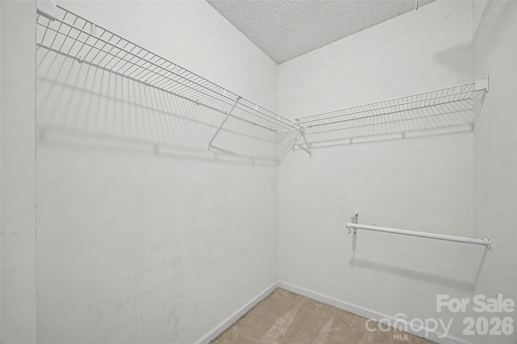 232 Butler Place Fort Mill, SC 29715 - Photo 18 of 32 a view of a room with racks on the wall