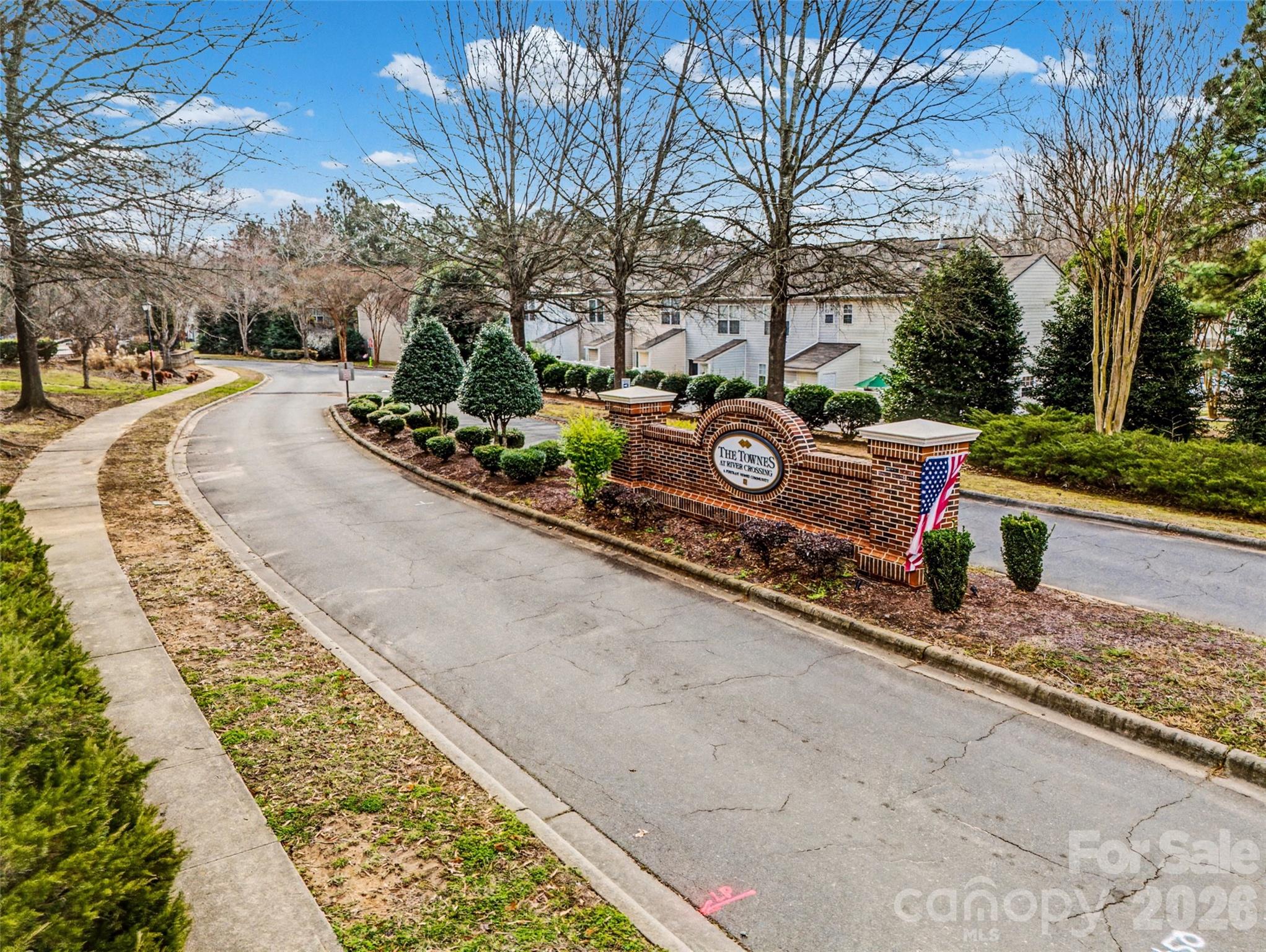 232 Butler Place Fort Mill, SC 29715 - Photo 27 of 32 a front view of a house with a yard