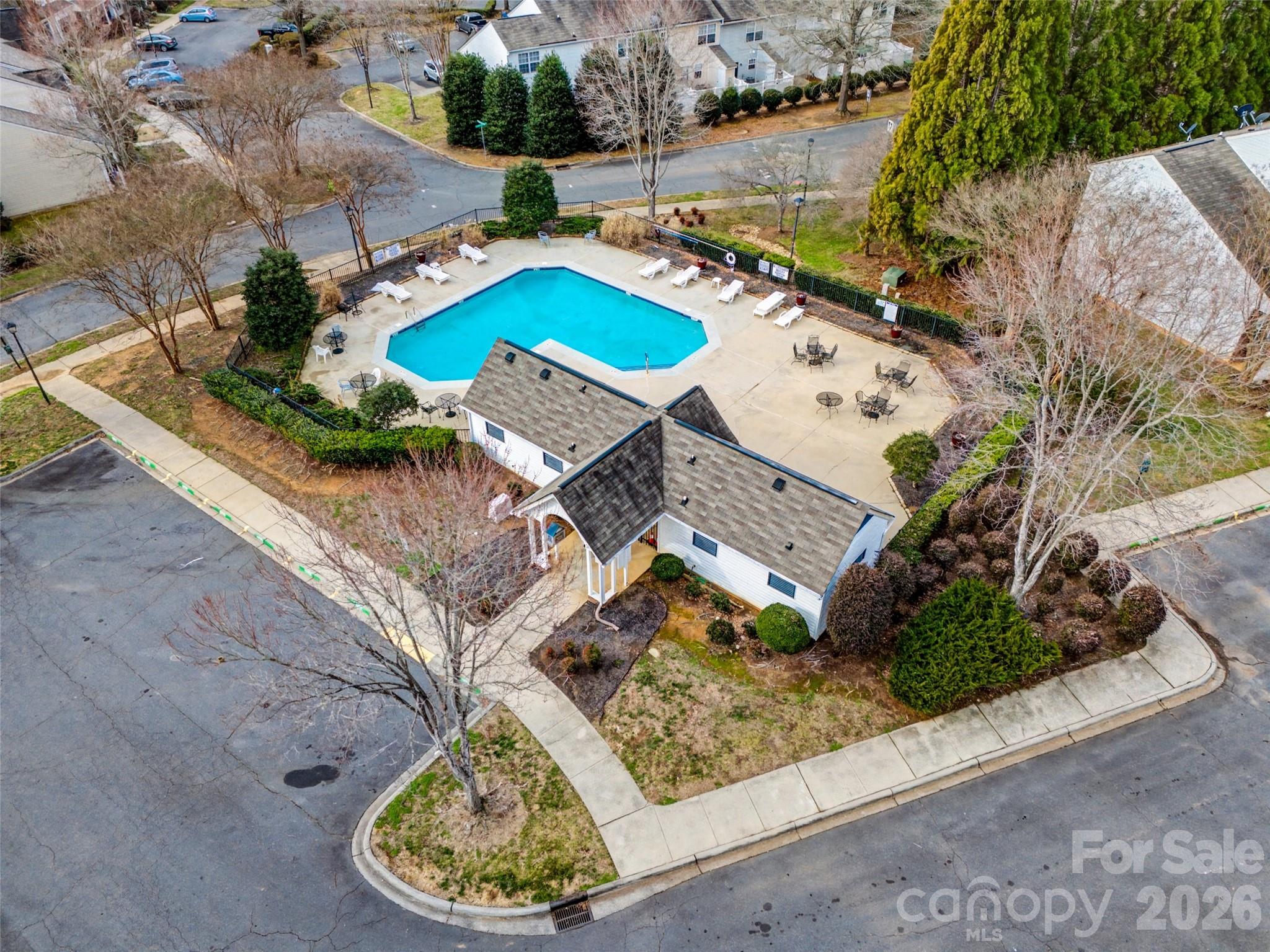 232 Butler Place Fort Mill, SC 29715 - Photo 29 of 32 an aerial view of a house with a yard and a large tree