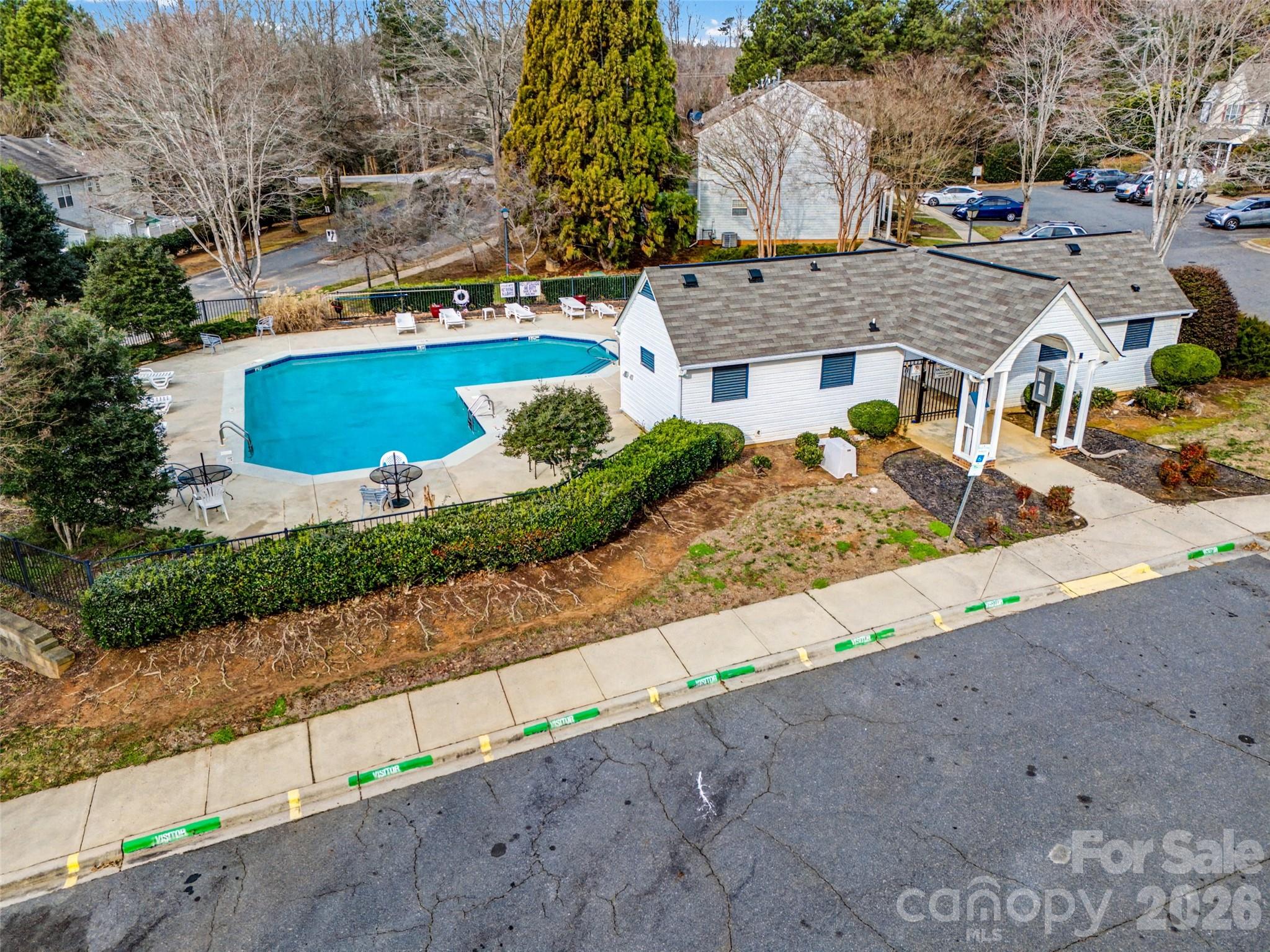 232 Butler Place Fort Mill, SC 29715 - Photo 31 of 32 an aerial view of a house with a yard and potted plants