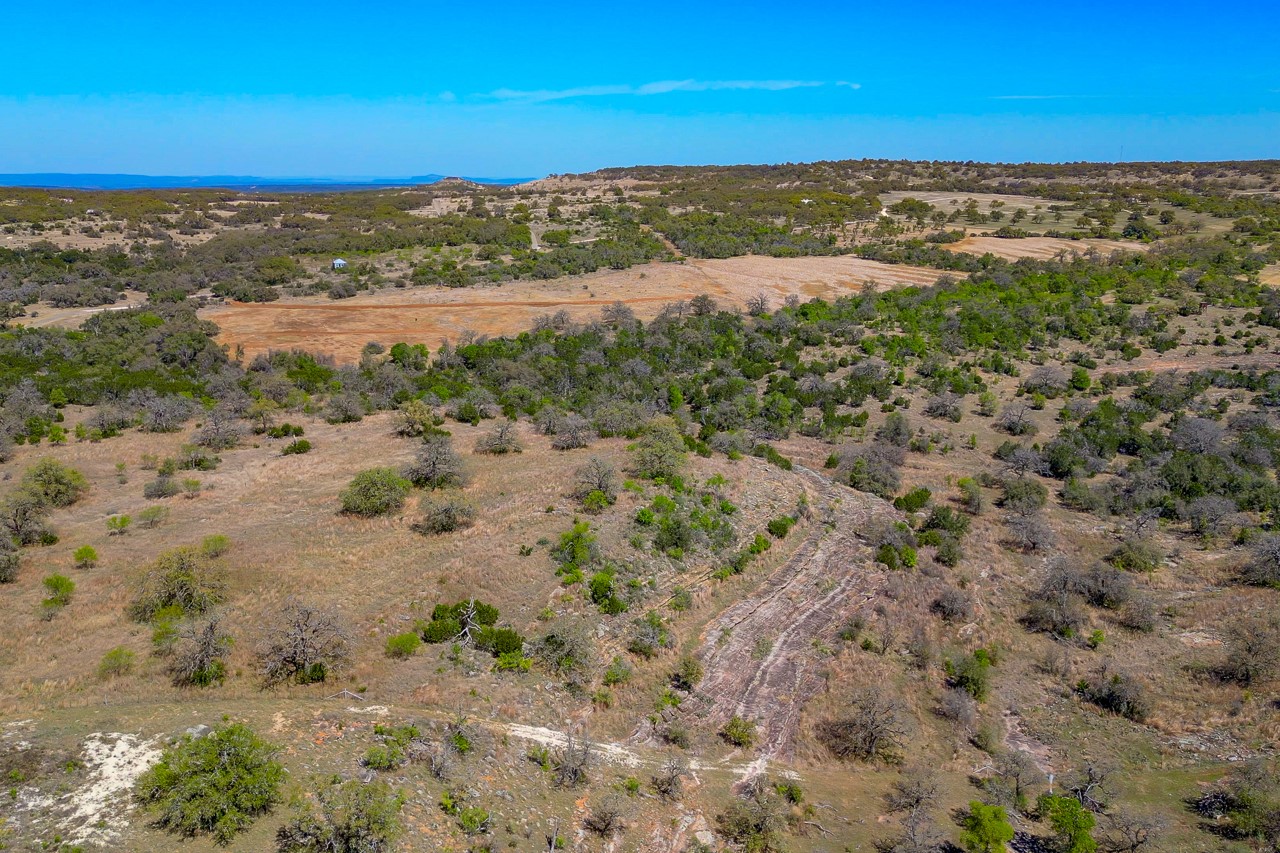 Tbd Tbd Smith West Road Johnson City, TX 78636 - Photo 15 of 36 Aerial view of sparsely populated area with a desert landscape