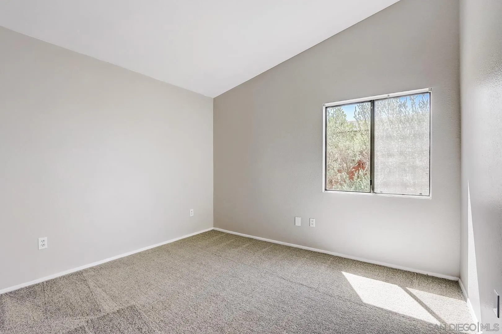 11988 Mountainview Heights Lakeside, CA 92040 - Photo 11 of 26 an empty room with a window