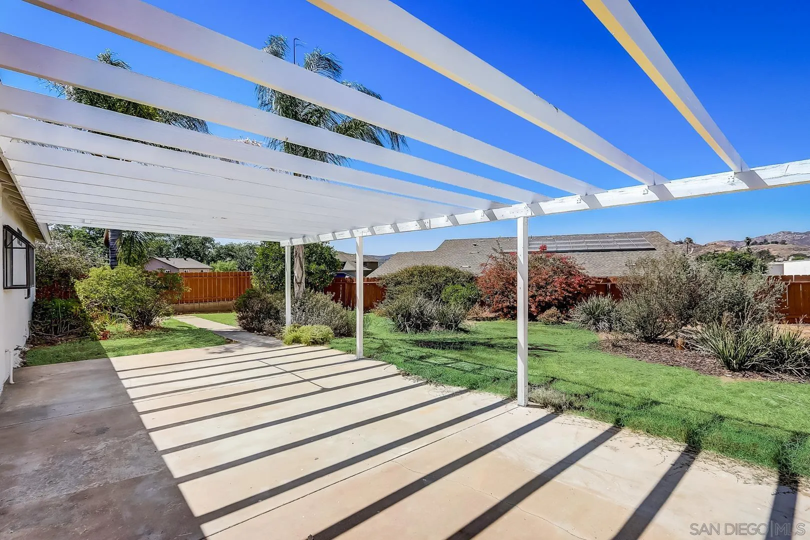 11988 Mountainview Heights Lakeside, CA 92040 - Photo 20 of 26 a view of a patio with a table and chairs