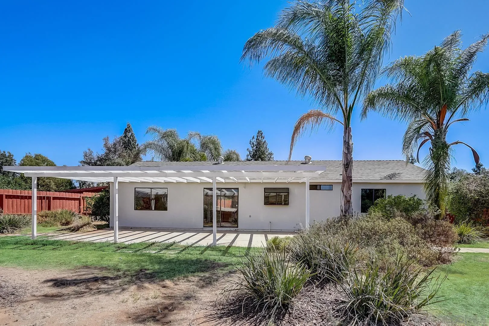 11988 Mountainview Heights Lakeside, CA 92040 - Photo 23 of 26 a view of a house with a backyard