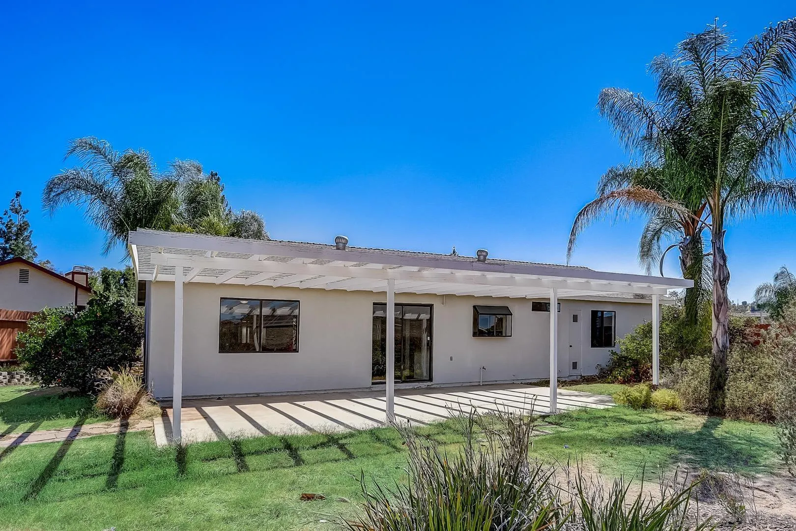 11988 Mountainview Heights Lakeside, CA 92040 - Photo 24 of 26 a view of a house with a yard