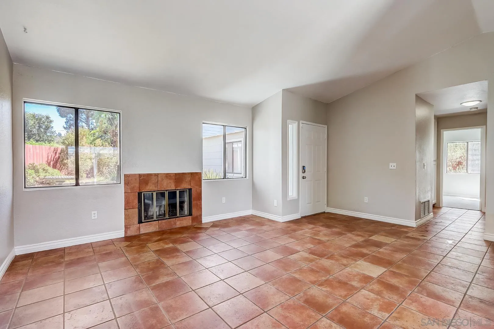 11988 Mountainview Heights Lakeside, CA 92040 - Photo 6 of 26 a view of empty room with a fireplace