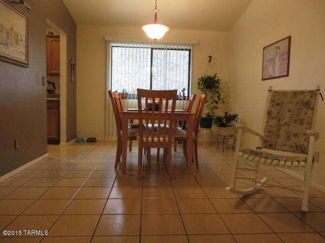 963 Calle Amarillo Rio Rico, AZ 85648 - Photo 10 of 31 a view of a dining room with furniture
