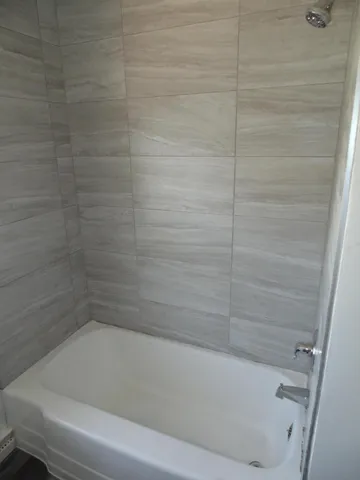 a bathroom with a bathtub