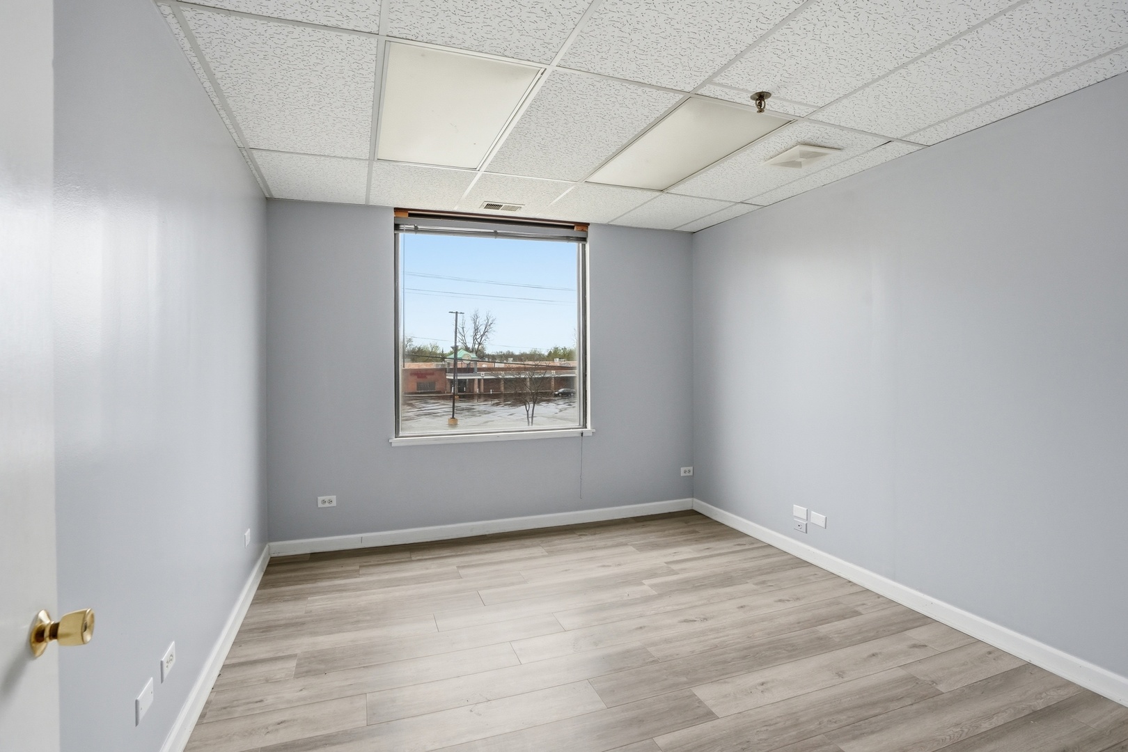 2071 Irving Park Road Hanover Park, IL 60133 - Photo 11 of 53 an empty room with a empty space and windows