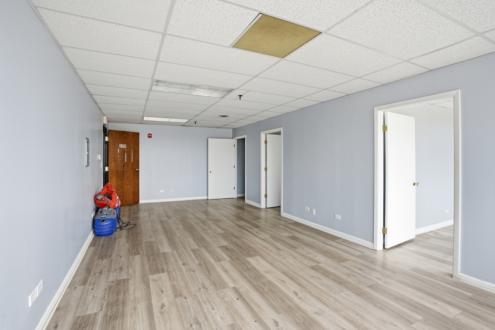 2071 Irving Park Road Hanover Park, IL 60133 - Photo 34 of 53 a view of empty room with wooden floor