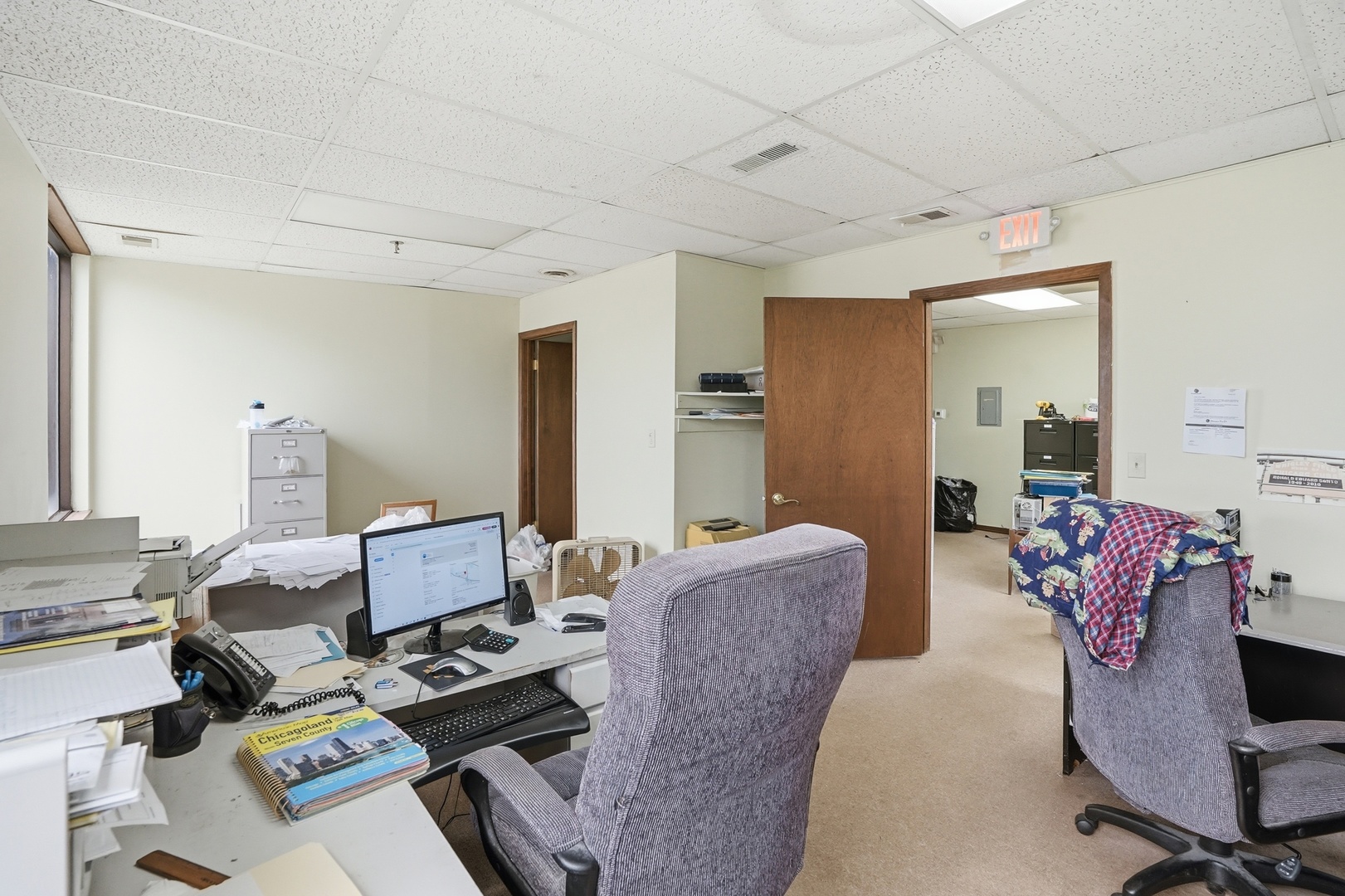 2071 Irving Park Road Hanover Park, IL 60133 - Photo 39 of 53 a workspace with furniture and wooden floor