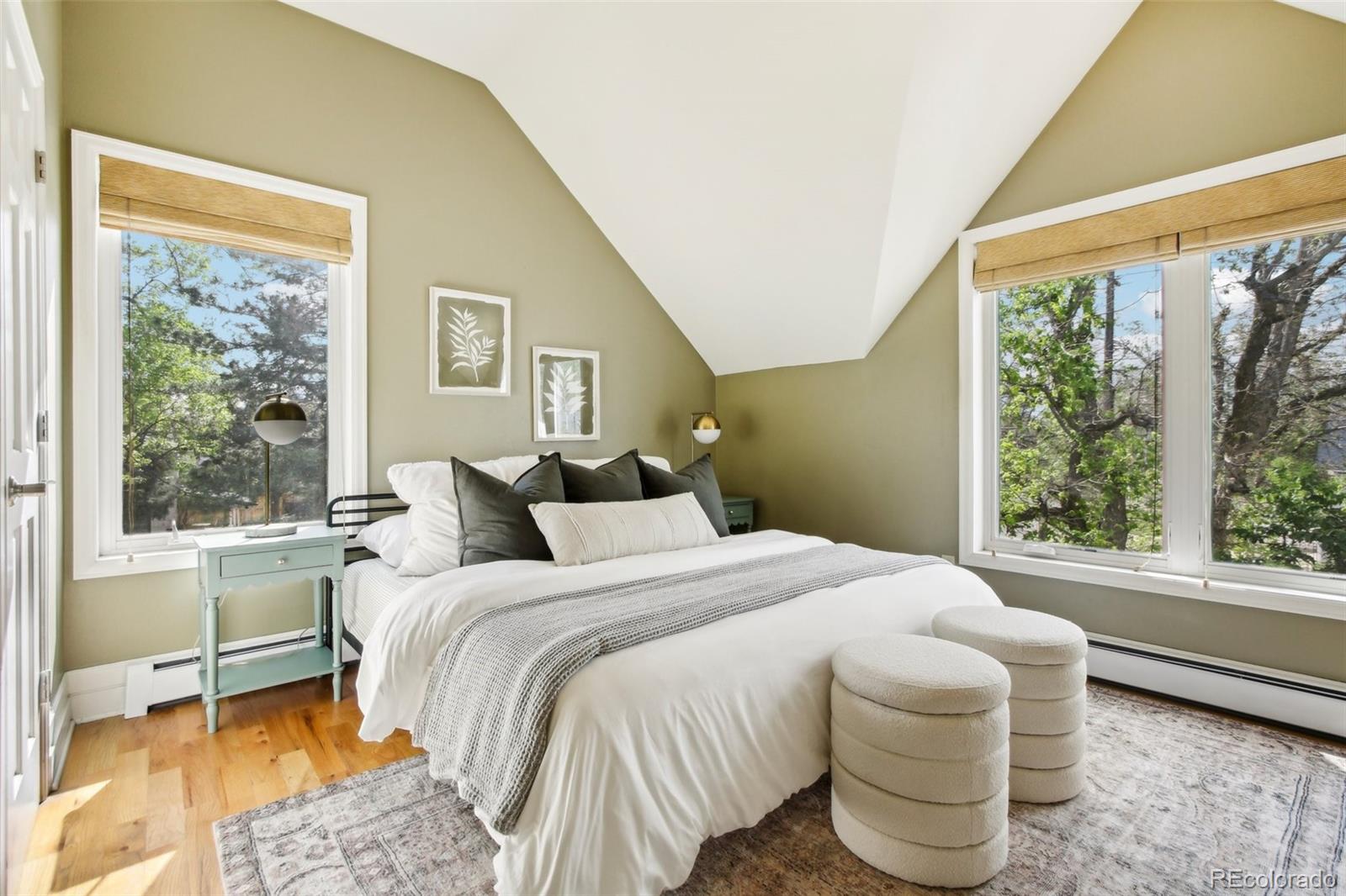 2255 18th Street Boulder, CO 80302 - Photo 15 of 45 a bedroom with a bed and a large window
