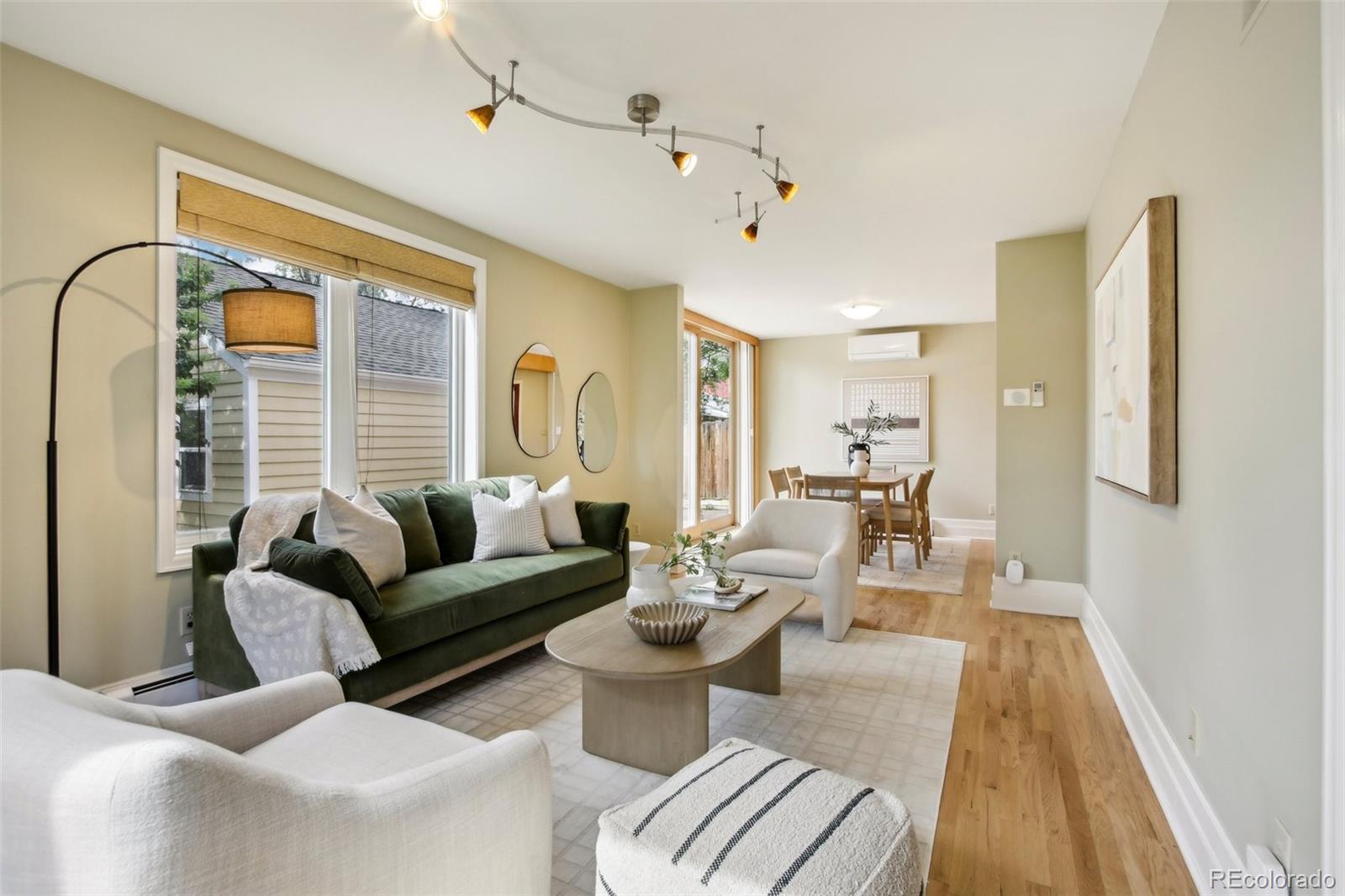 2255 18th Street Boulder, CO 80302 - Photo 2 of 45 a living room with furniture and a large window