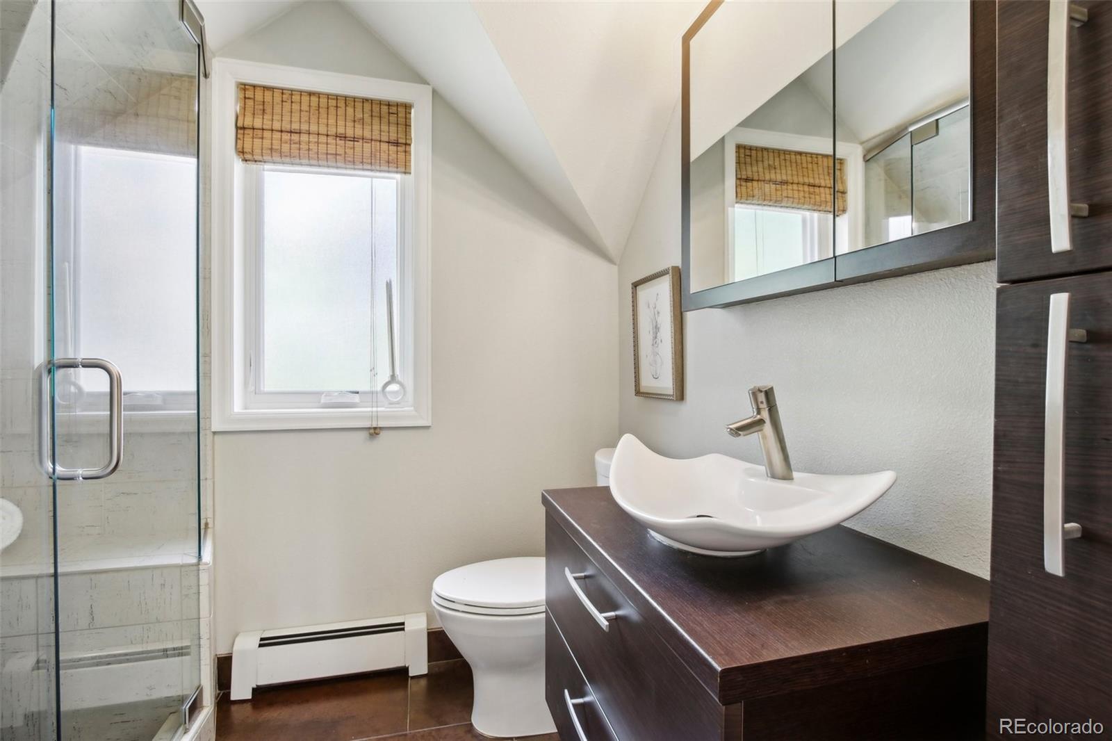 2255 18th Street Boulder, CO 80302 - Photo 22 of 45 a bathroom with a sink and a toilet