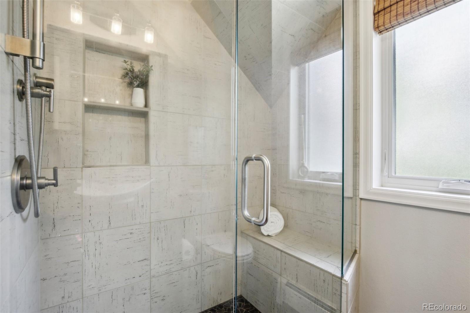 2255 18th Street Boulder, CO 80302 - Photo 23 of 45 a bathroom with a shower